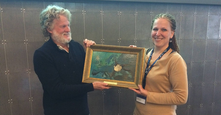 Professor Hal Whitehead, last year's ESC award winner, handing over the award to Ms. Heidrun Frisch-Nwakanma